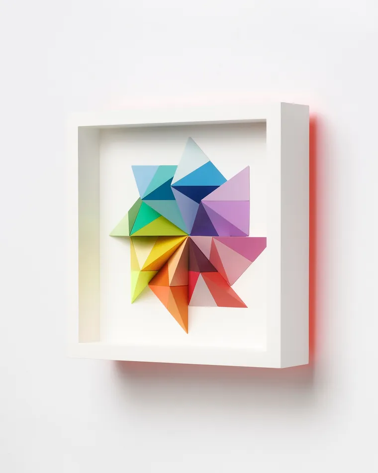 wooden geometric wall sculpture by Sean newport - rainbow