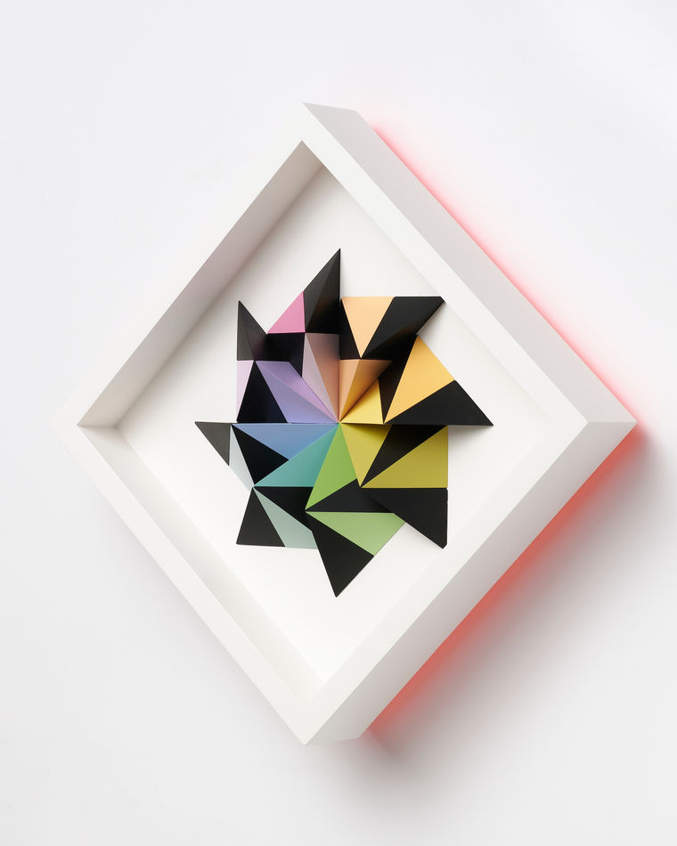 wooden geometric wall sculpture by Sean newport - rainbow