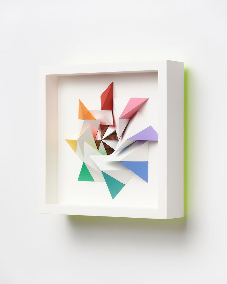 wooden geometric wall sculpture by Sean newport - rainbow