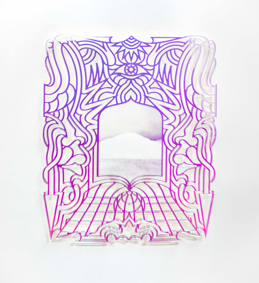 laser-cut transparent acrylic plaque with iridescent film with a design featuring a an eye, arrows, a sun and flowers.