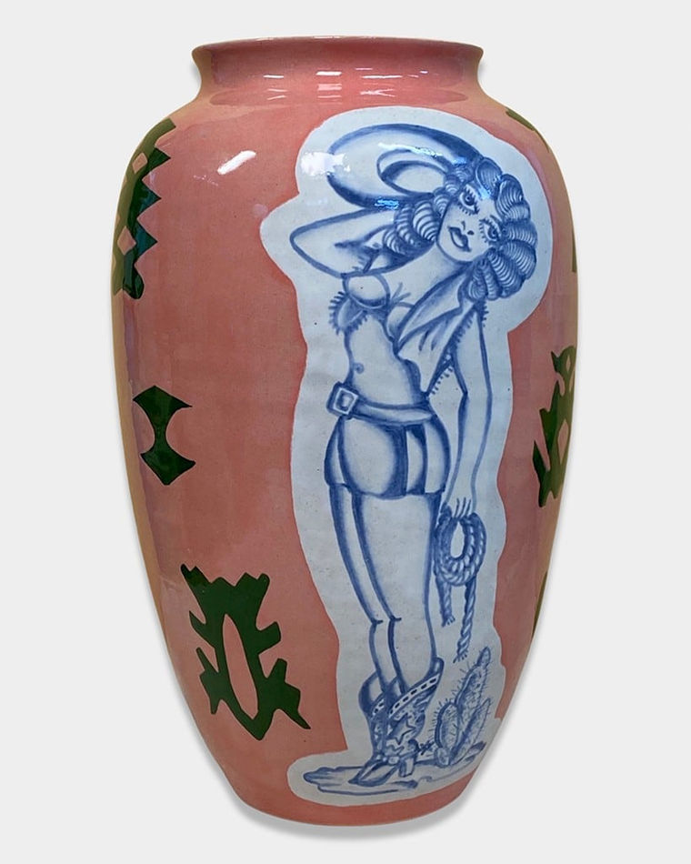 A pink ceramic pot with mickey mouse holding a gun, bugs bunny wearing cowboy outfit and a pinup girl holding her hat in her hands