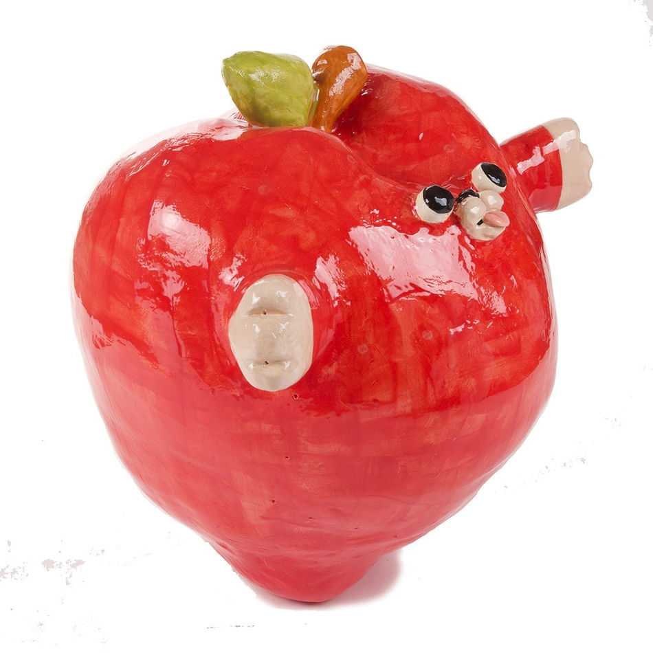 Katie Kimmel's ceramic sculpture of a red apple with a face and arms