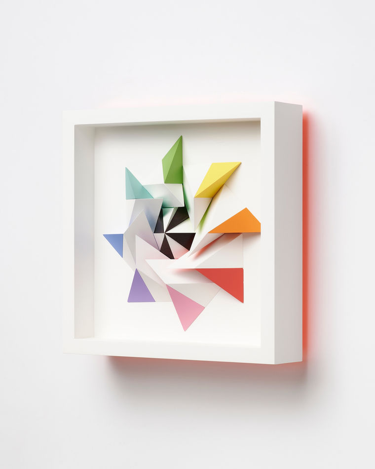 wooden geometric wall sculpture by Sean newport - rainbow