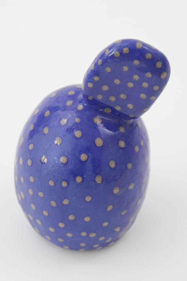 Jen Dwyer sculpture - two blue rounded stacked shapes with light dot accents