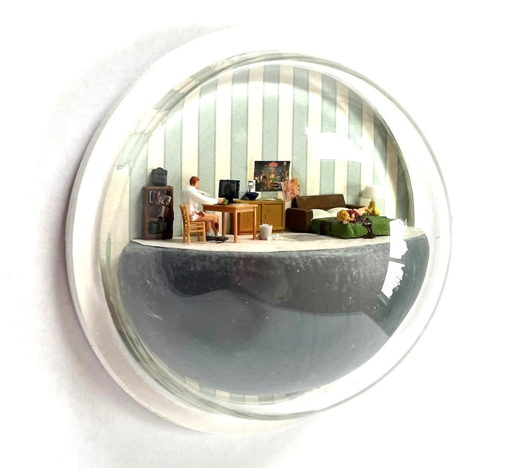 sculpture in glass case