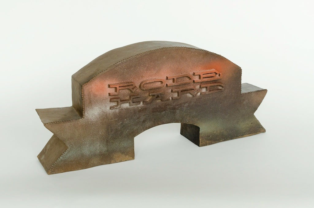 ceramic banner with the words rode hard, put away wet