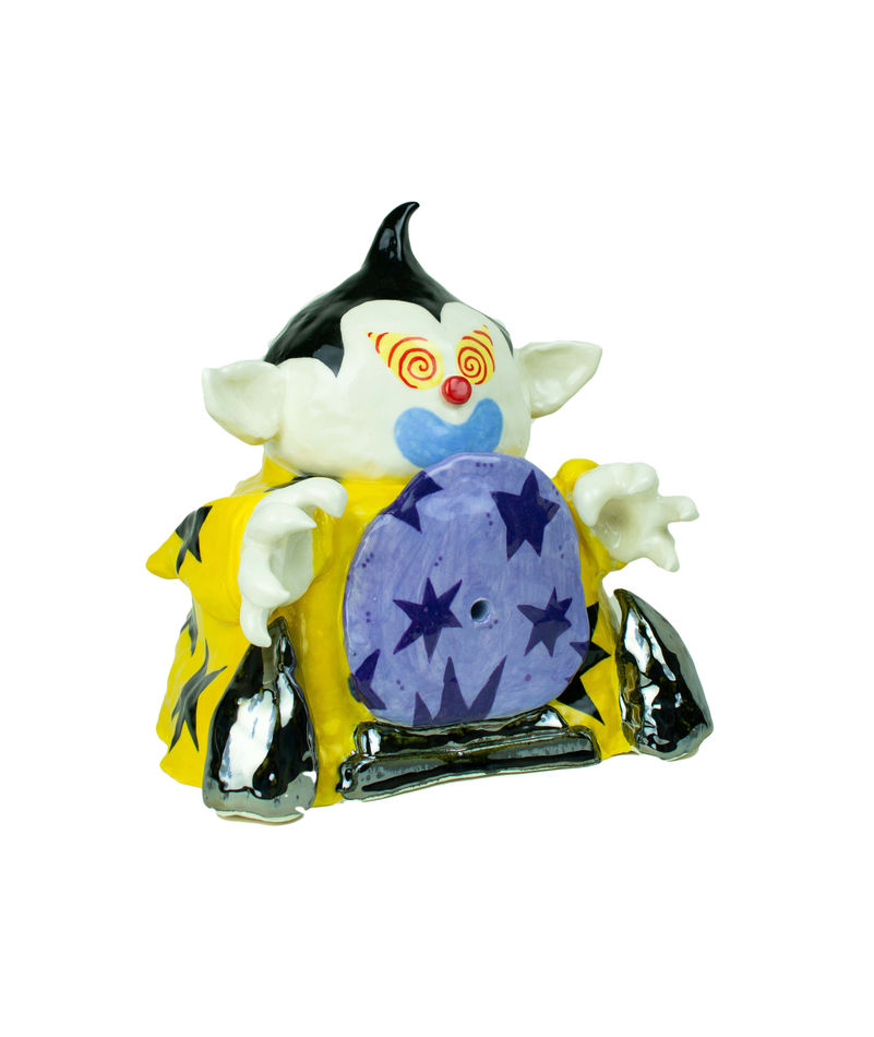 Christopher Gale's sculpture of goblin figure with a yellow jacket and black stars