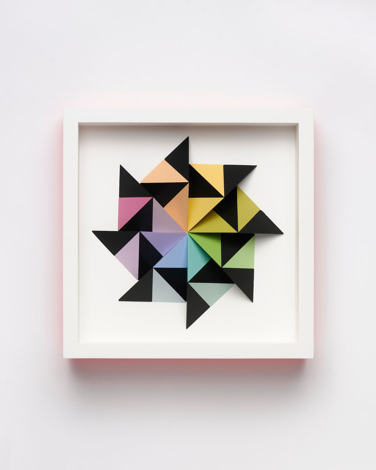 wooden geometric wall sculpture by Sean newport - rainbow
