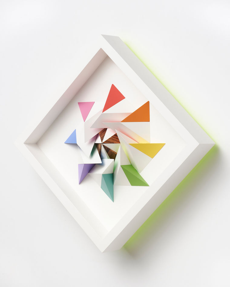 wooden geometric wall sculpture by Sean newport - rainbow