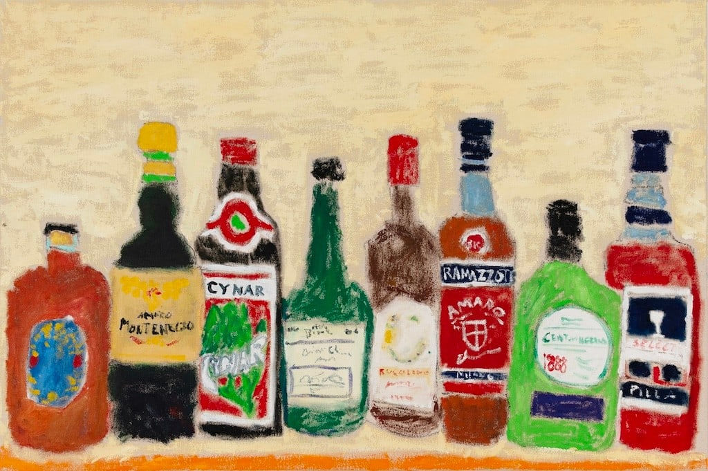 of line of different alcohol bottles