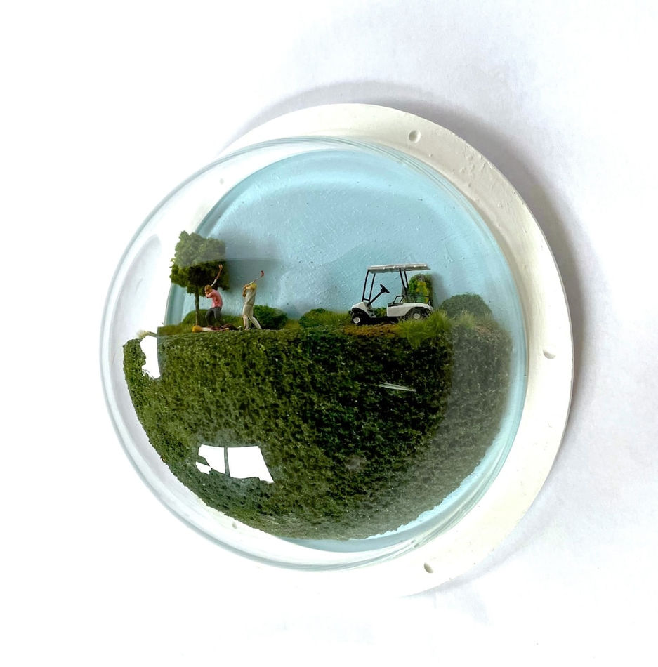 sculpture in glass case