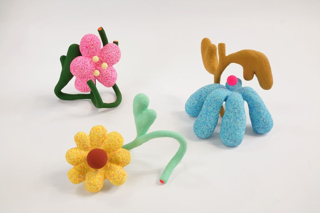 group of colorful flower sculptures