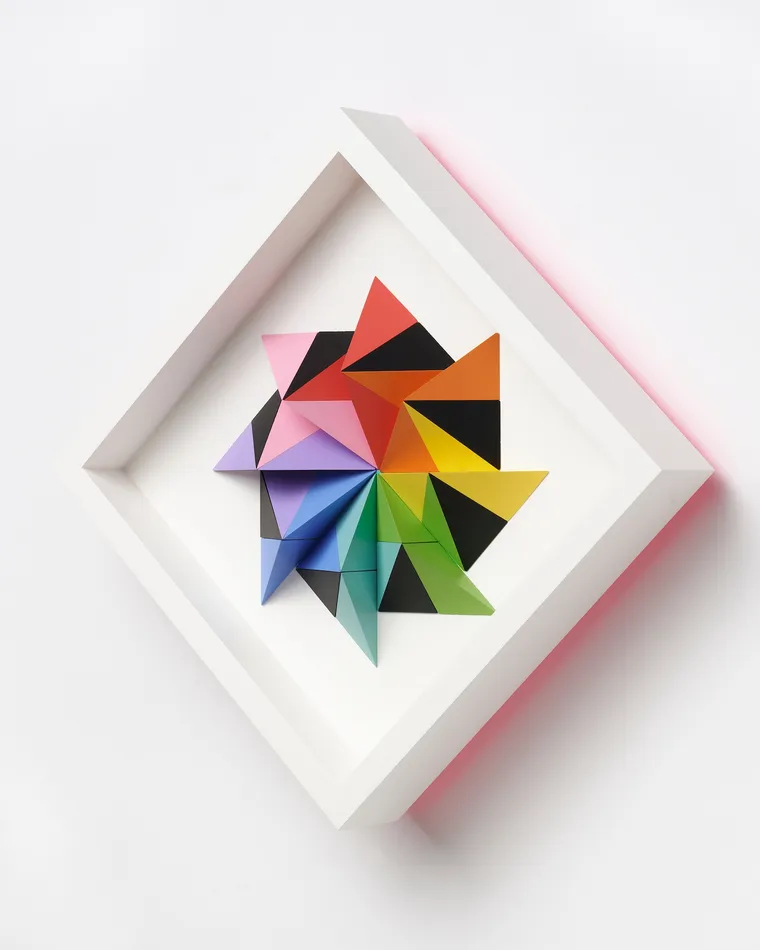 wooden geometric wall sculpture by Sean newport - rainbow