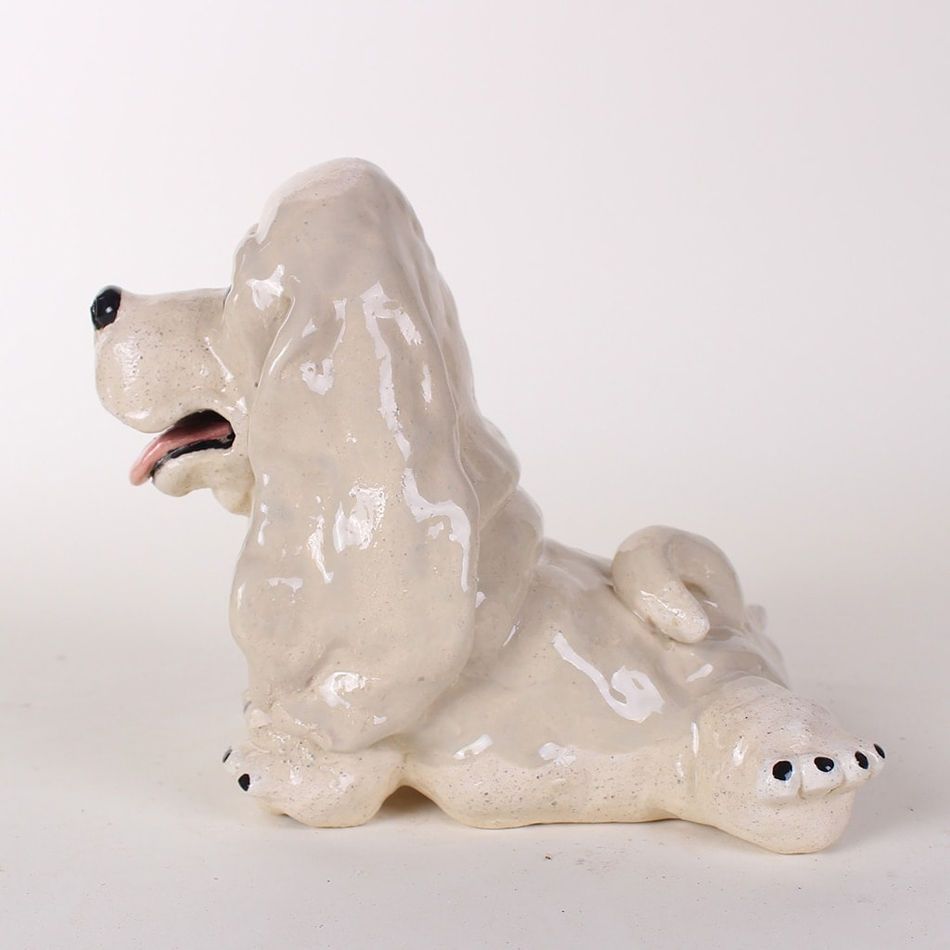 Katie Kimmel - ceramic sculpture of a white basset hound
