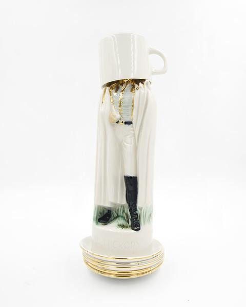 Jeremiah Jenkins scupture of figure in black boots and all white outfit with oversized teacup covering their head