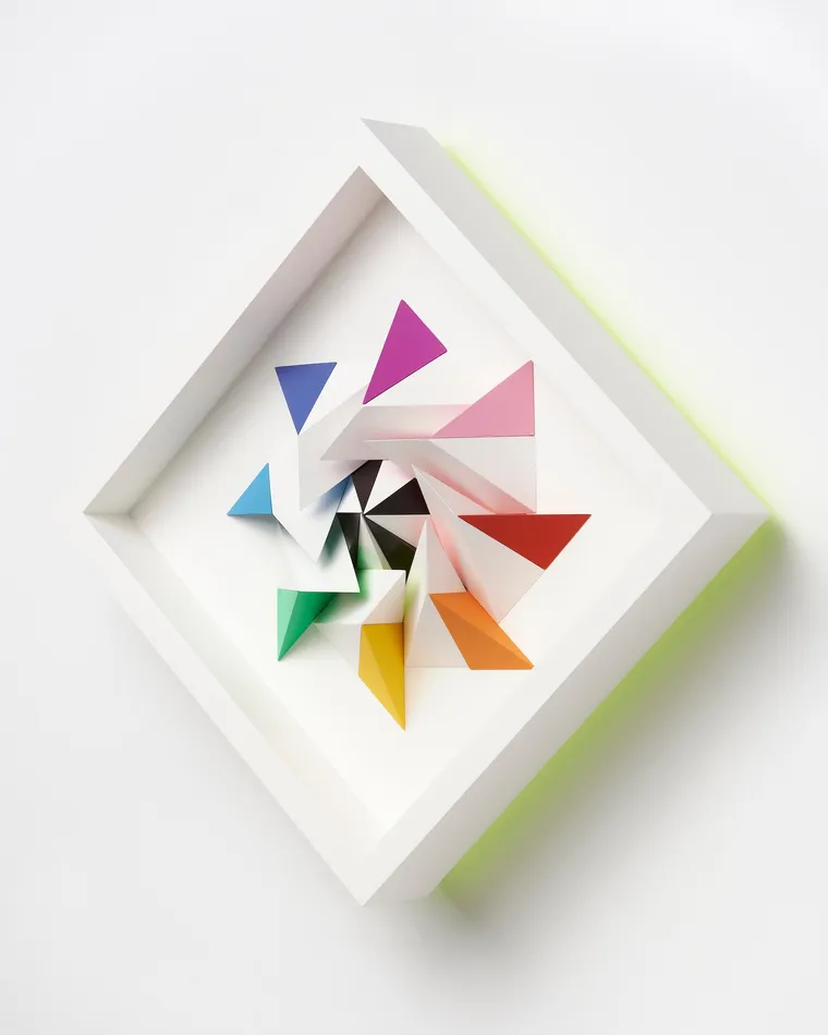 wooden geometric wall sculpture by Sean newport - rainbow
