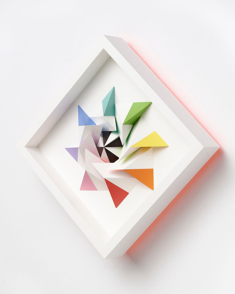 wooden geometric wall sculpture by Sean newport - rainbow