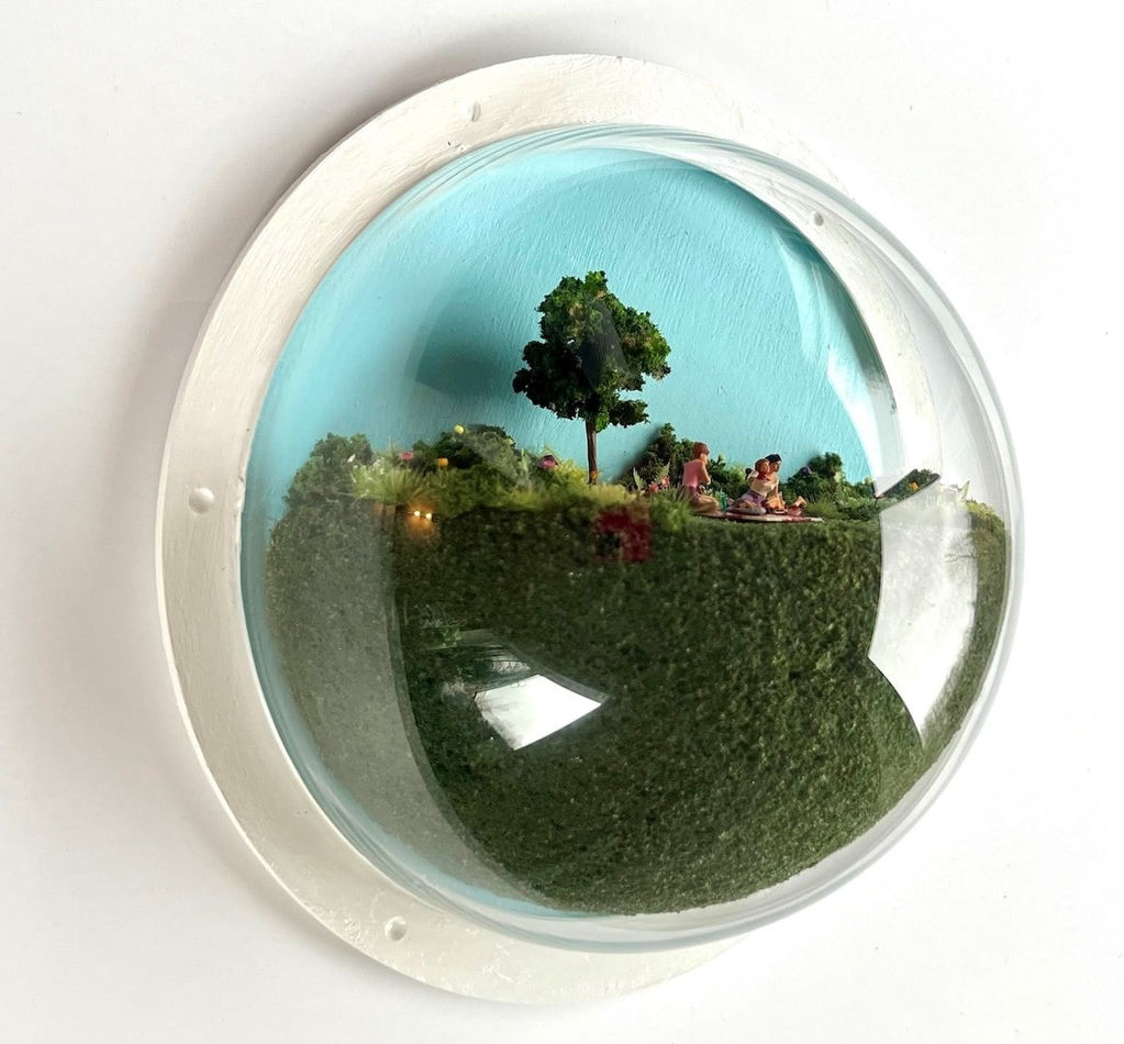 sculpture in glass case