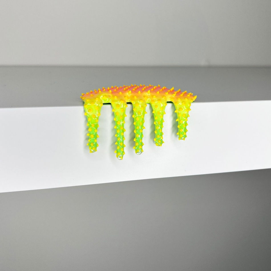 blob sculpture in yellow and green