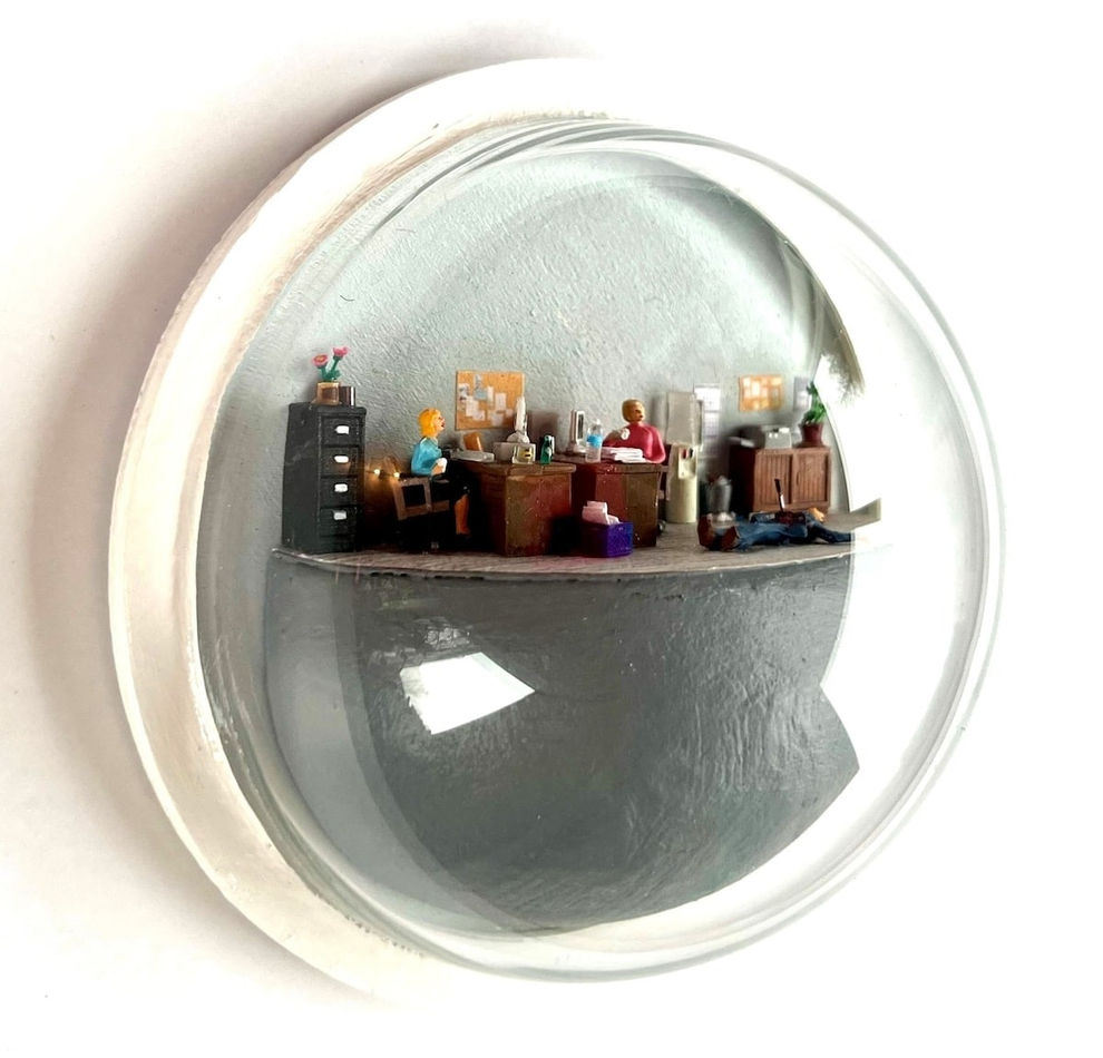 sculpture in glass case