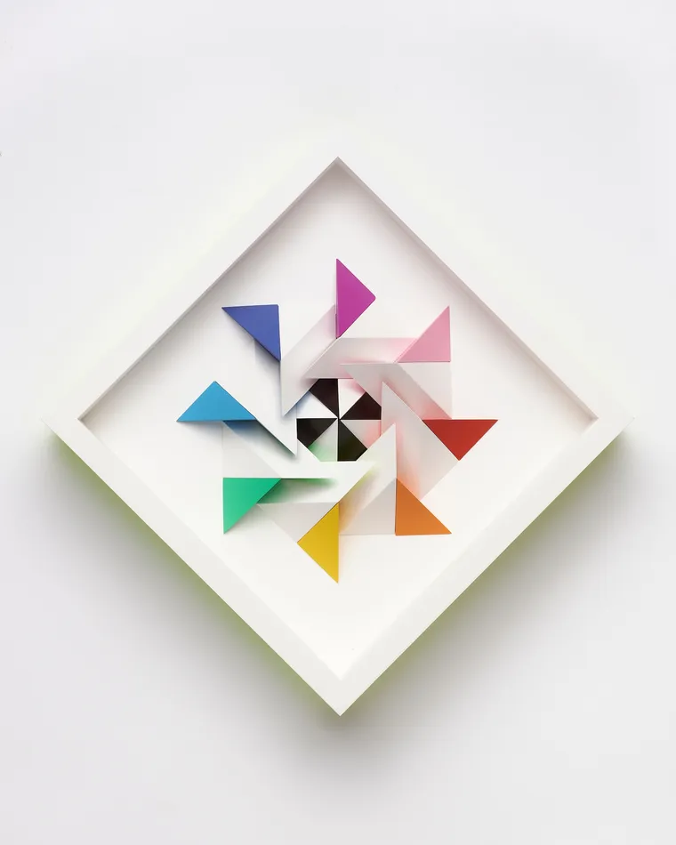 wooden geometric wall sculpture by Sean newport - rainbow
