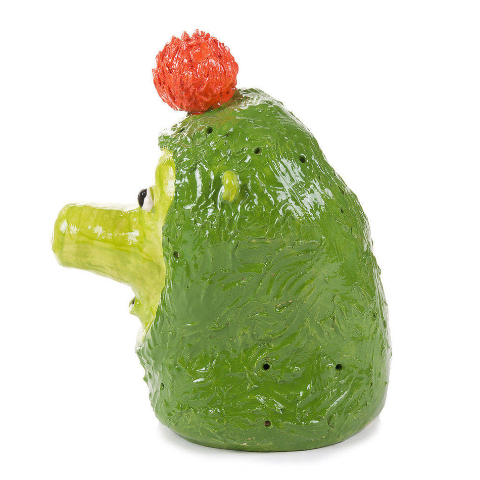 Katie Kimmel's ceramic sculpture of a green figure with a red ball on its head