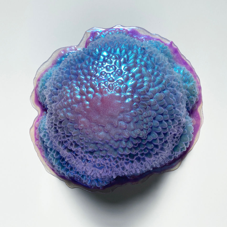 Sculpture by Dan Lam of a slimy dripping sphere