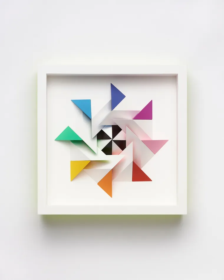 wooden geometric wall sculpture by Sean newport - rainbow