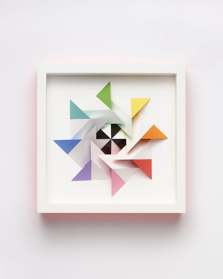wooden geometric wall sculpture by Sean newport - rainbow