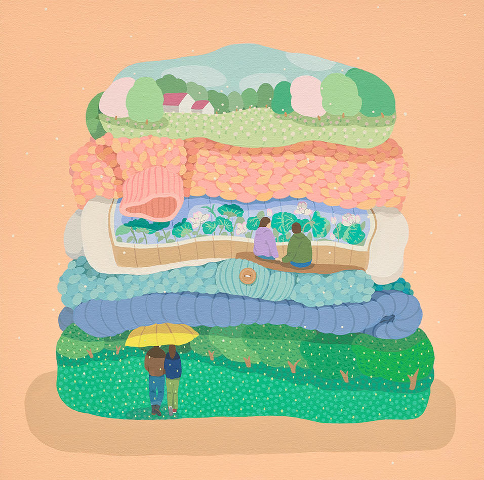 pile of folded laundry with various colorful patterns and scenes on an orange background