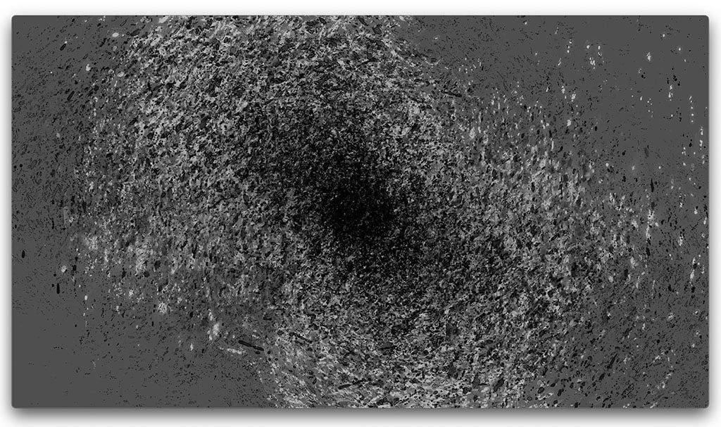 Still from video showing a black hole on a gray background