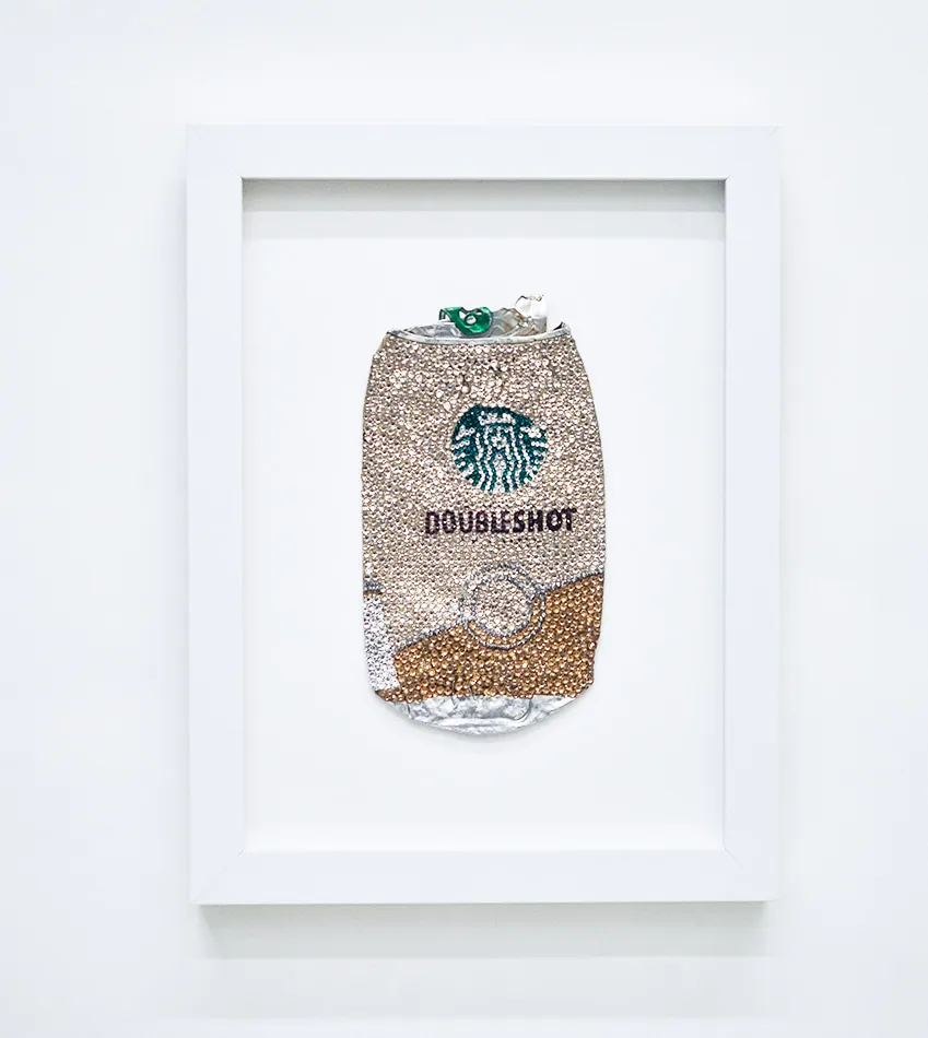 Sam Keller sculptural wall piece framed featuring found Starbucks can and applied crystals