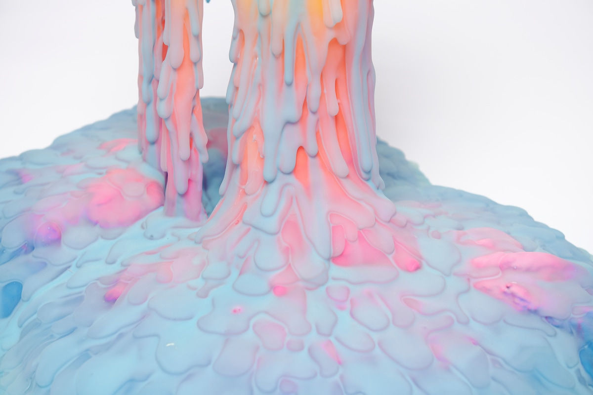Dan Lam slime sculpture with gradient of green, red, and blue