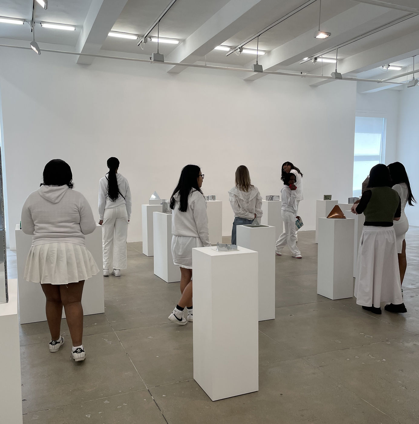 In an event sponsored by the Orchid Foundation, students take a tour of the Dan Graham Exhibition at Marian Goodman gallery