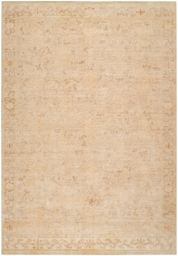 coraline rug in the ivory colorway. the design contains faded floral vines