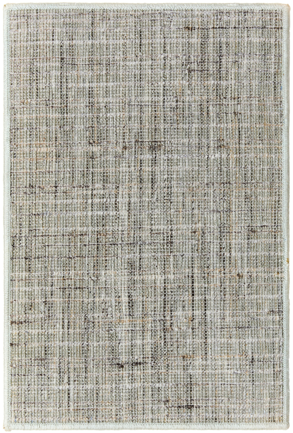 1'6" x 2'3" infinity sample in the steel colorway. the design is reminiscent of a scratched up wall