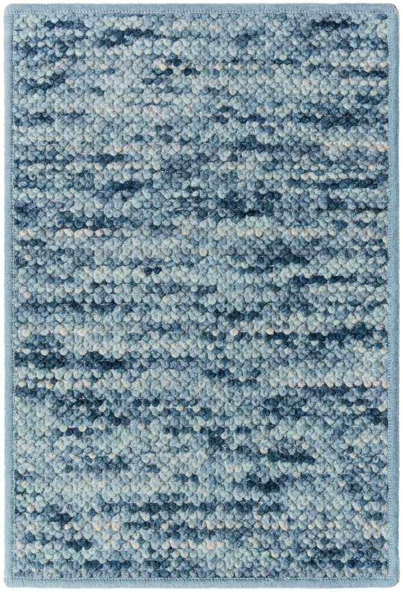 dove sample in the lotus colorway. the sample contains varying shades of blue on large loops.
