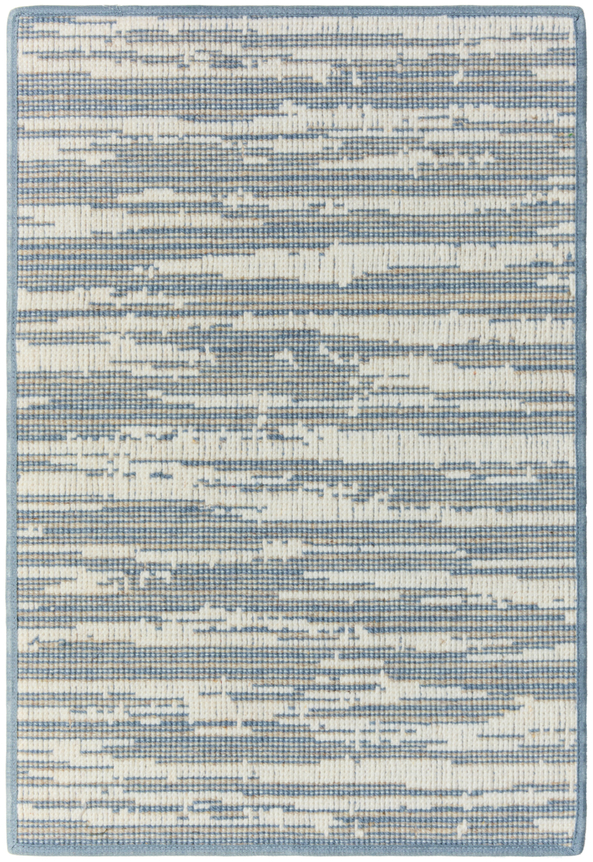 ashmore 1'2" x 1'6" sample in the denim colorway. the design looks like rock crust