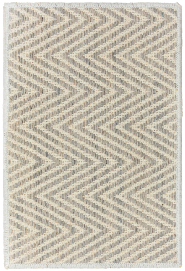 1'6" x 2'3" quincy sample in the mist colorway. the design is a horizontal chevron going back and forth