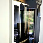 Aptère VI abstract painting of Frédéric Halbreich black and white and brown calligraphic contemporary painting oil painting lacquer on wood at Art Yi gallery in Brussels