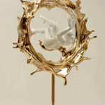 Floating of thoughts contemporary bronze sculpture godern sculpture of a circle of water and a white naked swimming woman from Liang Binbin Chinese artist sculptor