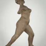 Figurative ceramic sculpture by artist Emilio DiIorio. Female figure is No. 3 in artist's The Dance series in gray clay.