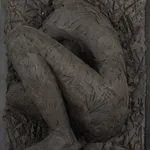 Ceramic relief in black clay in sculptor Emilio DiIorio's Women of Troy series.