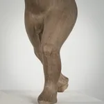 Figurative ceramic sculpture by artist Emilio DiIorio. Female figure is No. 3 in artist's The Dance series in gray clay.