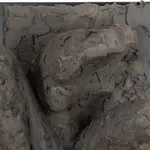 Ceramic relief in black clay in sculptor Emilio DiIorio's Women of Troy series.