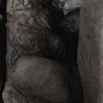 Ceramic relief in black clay in sculptor Emilio DiIorio's Women of Troy series.