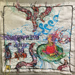 back of embroidery showing tangled threads