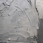 Detail photo of “Brise De Blanc”, sculptural painting by Sylvain Tremblay artist from Quebec, Canada, based in Dubai. Available at Carousel Fine Art Miami. The artist's technique involves mastering texture in painting, using modeling paste, acrylic, and sculptural elements with a glossy varnish. His works are infused with the essence of nature and humanity, showcasing his mastery of texture and form. Colors of this work : Grey, White