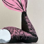 Detail photo of “Mermaid Tango Dream”, mixed media work on recycled card stock by BYC artist, from Switzerland. Available at Carousel Fine Art Miami. With a reimagined vision of Street and Contemporary Art, the artist's technique involves spray paint and acrylic marker. This artwork invites us to reflect on our own dreams and the paths to achieving them, even when they appear out of reach. Colors of this work : Grey, Black, White, Pink