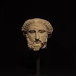 SOUTH ITALIAN GREEK, Fragmentary Head of a Bearded God, South Italian Greek, c. 4th century BC